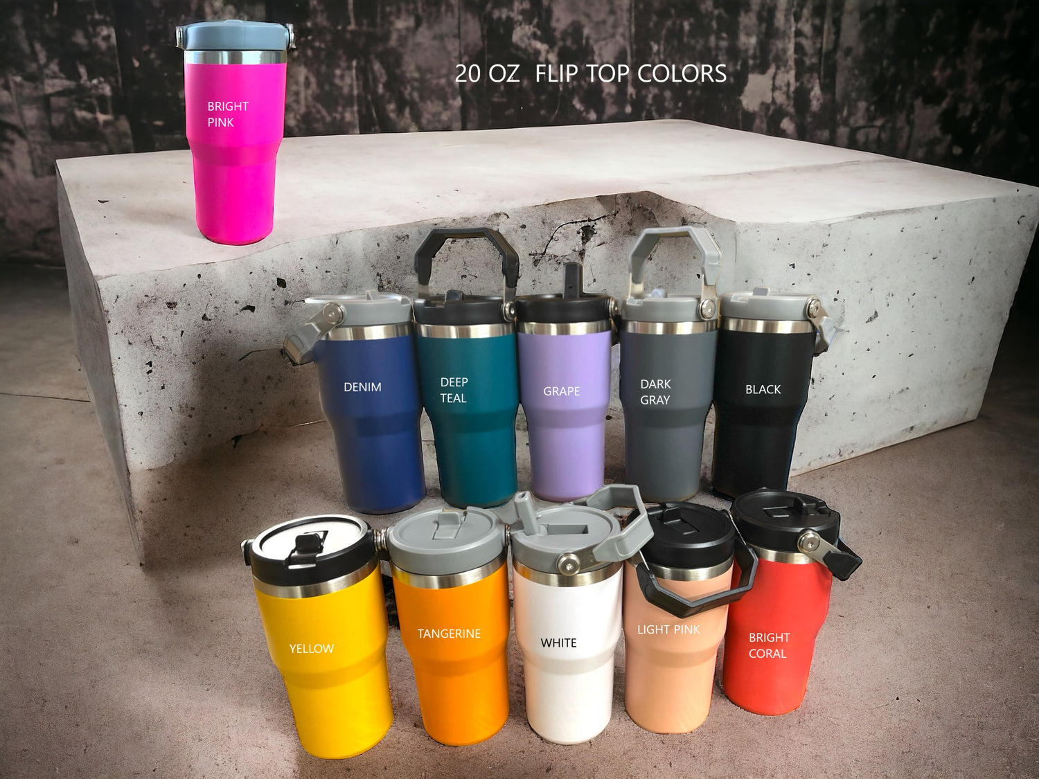 20 oz tumblers with a variety of colors sitting on a concrete shelf.